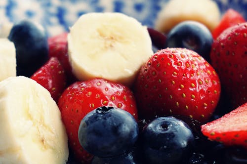 Free Sliced Strawberries, Banana, and Blackberries Stock Photo